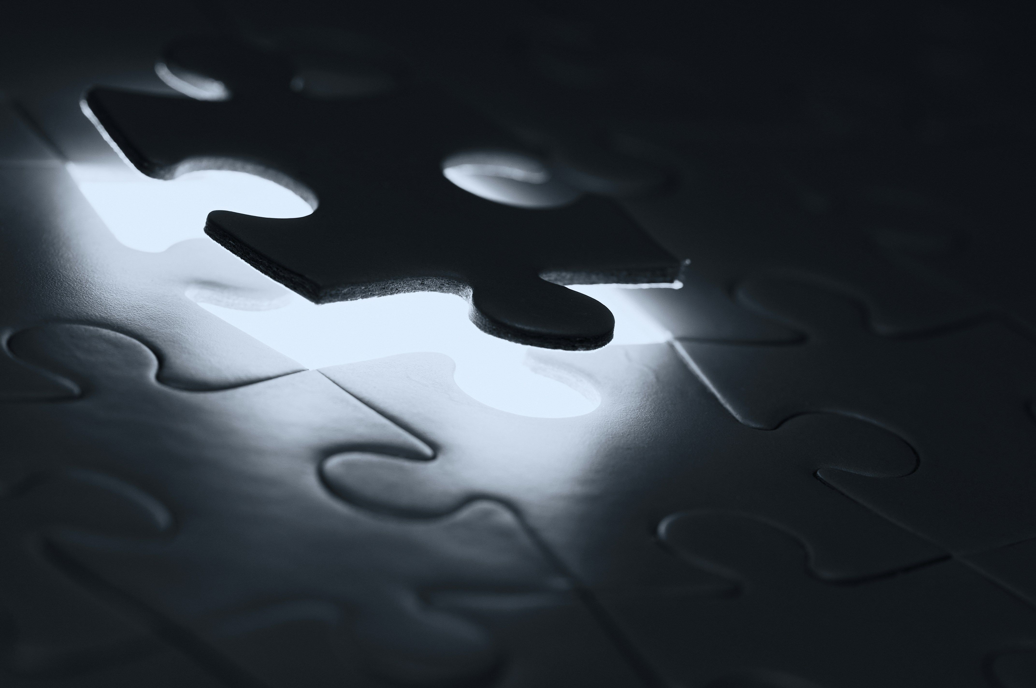 Jigsaw Puzzle pieces with light